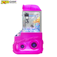 Mini machine à griffes de table colorée à prix abordable, machine de jeu d'arcade à monnayeur, distributeur de bonbons et mini-jouets en promotion