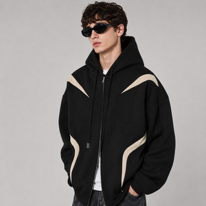Sweat à capuche zippé noir personnalisé avec empiècements color block crème, en molleton de coton épais, avec logo, coupe oversize, style sport streetwear, haut de gamme pour homme - Product Image 1