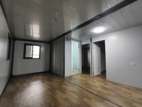 Maison conteneur préfabriquée de luxe moderne de 20/30/40 pieds avec panneaux sandwich, salle de bain et cuisine extensibles, certifiée CE