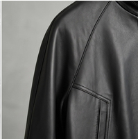 Manteau en cuir d'agneau souple de haute qualité pour femme, noir, col montant, taille ajustable avec cordon, manches raglan