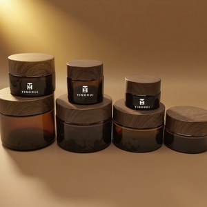 Luxury 30g 50g 60g 2oz Empty Amber Plastic Bamboo <b>Wood</b> Grain Cream <b>Jar</b> Black <b>Lid</b> Amber <b>Glass</b> Cosmetic <b>Jar</b> <b>with</b> Body Butter Cream - Product Image 1