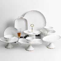 Service de table en porcelaine fine à prix d'usine, vente en gros, vaisselle en céramique blanche gaufrée, service de mariage avec bord doré, écologique