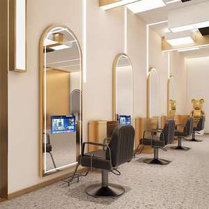 Miroir de salon moderne avec télévision, grand miroir rond éclairé pour salons de beauté et salons, miroir TV à cadre doré LED arqué - Product Image 1