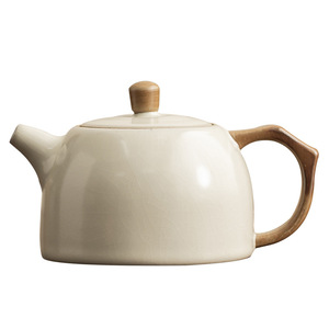 Tetera de Porcelana Ru de Color Amarillo Marfil de Alta Calidad, Gran Volumen, con Filtro Integrado, Vertido Suave, Ideal para la Familia y Momentos de Té en Solitario - Product Image 1