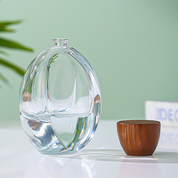 Flacon de parfum ovale transparent personnalisé de luxe 100 ml, flacon d'eau de Cologne à fond épais, bouchon en bois, vaporisateur de parfum