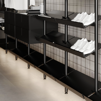 Présentoirs de Vêtements Minimalistes Personnalisés en Acier Inoxydable Noir Mat pour Magasin de Vêtements – Supports de Présentation Populaires