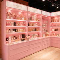 Vitrine de présentation de parfums personnalisée rose de luxe en bois et verre pour la conception de magasins de détail
