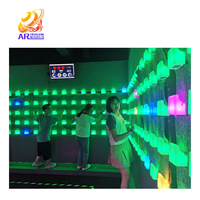 La lumière de maintien d'escalade à LED interactive d'intérieur améliore l'expérience du mur d'escalade pour le jeu d'activation de parc d'attractions