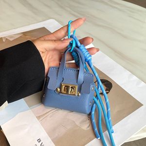 Mini llavero de cuero platino con colgante multifunción portátil para bolso, nuevo llavero para lápiz labial, auriculares y mini bolso - Product Image 6