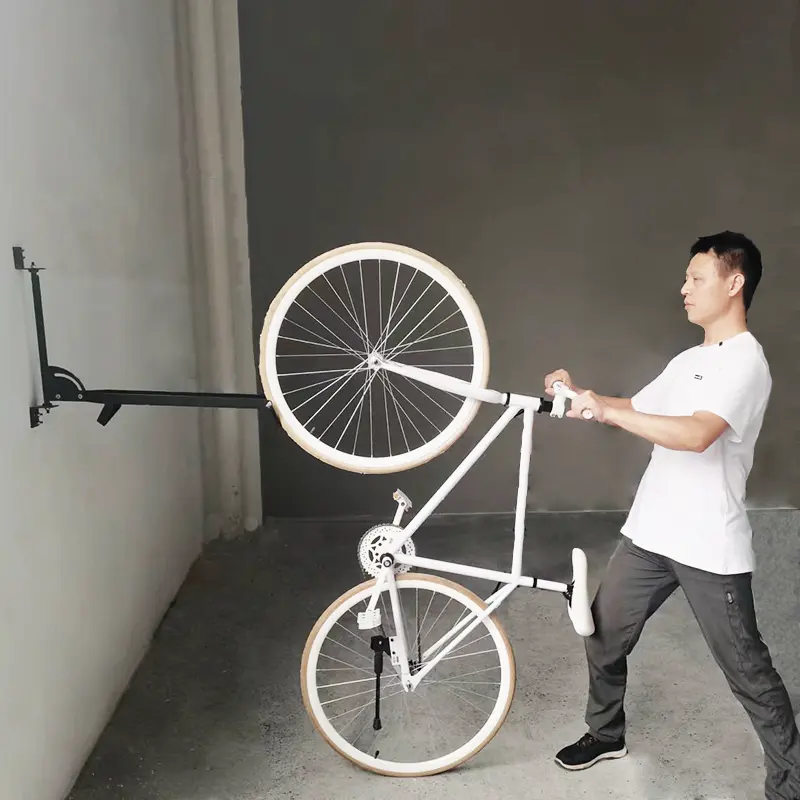 Ahorro de espacio Vertical fijo mariposa pared clip montado sólido bicicleta ciclo grasa neumático portabicicletas soportes