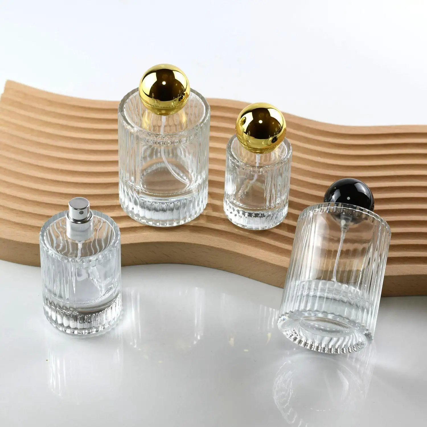 卸売20 ml 30 ml高級50 mlラウンドガラス香水瓶スプレー蓋付き縦縞ユニークな香水瓶