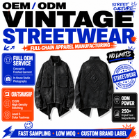 Blouson de travail noir vieilli à motif diamant gaufré haute fréquence, ourlet irrégulier, poches utilitaires, style streetwear, vente en gros OEM