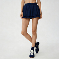 Ensemble de sport pour femme de créateur, couleur unie, avec jupe de tennis et soutien-gorge de sport, séchage rapide, sensation seconde peau, anti-transparence, coupe ajustée, col en V, résistant aux plis