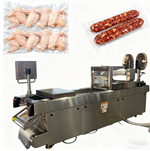 Machine d'emballage sous vide thermoformage compacte et précise pour l'emballage de petites quantités, idéale pour les ailes de poulet et les saucisses - Product Image 1