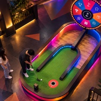 Jeu de golf interactif avec roue des prix colorée, défi de mini-golf, solution tout-en-un pour la location d'événements en parc d'attractions intérieur