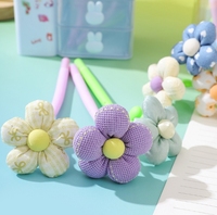 Nouveau stylo créatif en tissu à fleurs neutres - Petites fleurs colorées mignonnes - Stylo musical à hochet - Stylo signature
