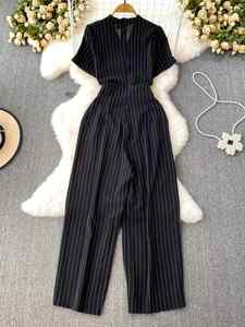 Mono casual de verano de talla grande con cuello en V para mujer, mono largo a rayas con encaje de cintura alta, overoles casuales para mujer al por mayor - Product Image 3