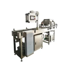 Ligne de production automatique de moulage de truffes en chocolat Machine pour la fabrication de chocolat