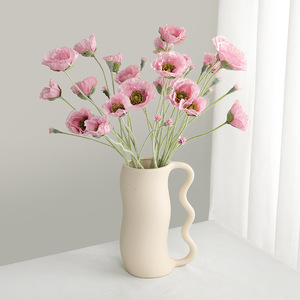 Cinq fausses coquelicots islandais en polyester pour décorer le salon et la table à manger - Product Image 1
