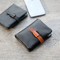 Dompet Pendek Lipat Vertikal Kulit Sapi Impor Dengan Penutup Tali Kulit