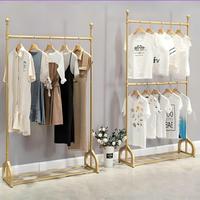 Porte-vêtements en métal doré de luxe moderne et robuste sur mesure pour balcon et armoire