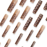 Ongles press-on extra longs bleus phosphorescents pour Halloween, motif citrouille, sorcière, fantôme, dégradé, 24 pièces, faux ongles de luxe pour femmes, fête
