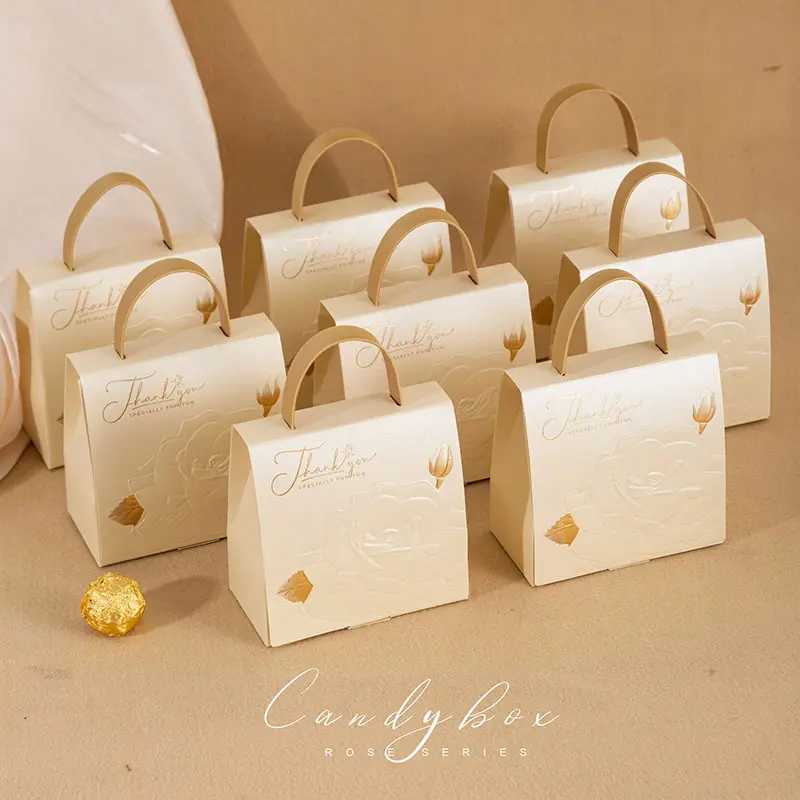 Cajas y bolsas de regalo de rosa en relieve dorado champán Caja de embalaje de papel de agradecimiento de mano de cuero para bodas Favores de fiesta