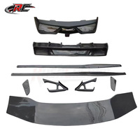 Kit carrosserie en fibre de carbone style DMC pour Lamborghini Gallardo : pare-chocs avant, jupes latérales, diffuseur arrière, spoiler.