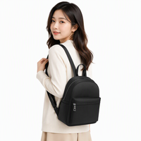 Sac à dos personnalisé mini imperméable GPS antivol avec fermeture éclair pour un usage décontracté unisexe, en nylon noir
