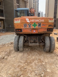 Excavatrice sur pneus Hitachi EX100 d'occasion de haute qualité, 10 tonnes, certifiée CE, avec attache rapide, brise-roche et tarière - Product Image 6