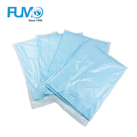 Feuille de papier médicale jetable imperméable, drap bleu, drap de lit d'hôpital pour table d'examen