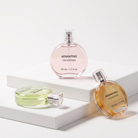 Nuevo frasco de perfume de vidrio vacío de 50 ml, elegante, de alta calidad, redondo, con diseño personalizado, para venta al por mayor.