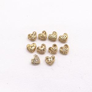 Perles d'espacement en acier inoxydable en forme de cœur yunnique pour la fabrication de bracelets, composants de bijoux moulés de 8 mm GZY-PJ07 - Product Image 1