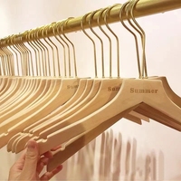 Fabrikant Groothandel Hoge Kwaliteit Hot Selling Ronde Hoofd Natuurlijke Bruine Houten Hanger Voor Kleding Winkel