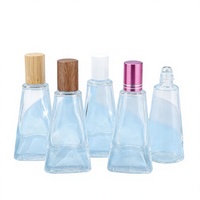 Vente en gros de flacons à bille en verre écologiques et recyclables de 10 ml pour huiles essentielles avec couvercles, flacons cosmétiques vides pour essences, logo personnalisé