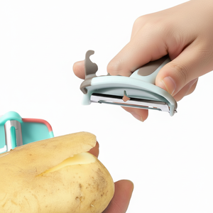 Vente en gros d'accessoires de cuisine en plastique et en acier inoxydable pour pommes de terre et légumes, éplucheur de pommes de terre à main, vente en gros pour pommes de terre - Product Image 1