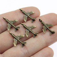 Breloque Avion de Passagers 23x15mm en Alliage de Zinc Argent Vieilli pour Bijoux d'Hôtesse de l'Air