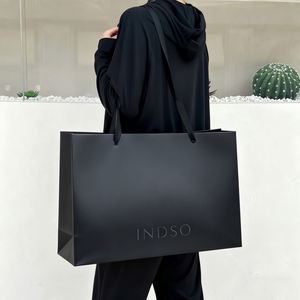 Sac en papier kraft de luxe personnalisé pour le shopping, carton ivoire de haute qualité avec logo de marque pour vêtements et chaussures - Product Image 1