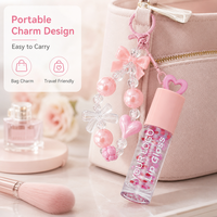 Fournisseur fiable de porte-clés cœur, gloss à lèvres OEM, marque privée, qualité stable, brillance succulente, breloque décorative, vente en gros