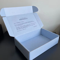 Boîte d'expédition en carton ondulé écologique avec logo imprimé personnalisé et doublure en éponge pour l'emballage cosmétique
