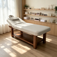 Lit de massage de luxe en bois massif Woodenjoy au design moderne, avec matériaux en cuir et surface lisse, idéal pour les spas et salons de beauté professionnels.