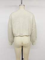 Vêtements en gros pour femmes : Cardigan en crochet brodé, style de marque, idéal pour les robes d'église