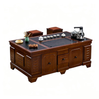 Table basse de bureau moderne avec étagères de rangement ouvertes, plateau en bois de noyer et structure noire, idéale pour les zones de réception