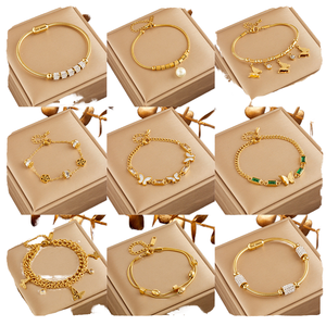 Commercio all'ingrosso delle signore in acciaio inossidabile braccialetto di moda con catena a maglie cubane fiore farfalla CZ perle di perle Pulsera