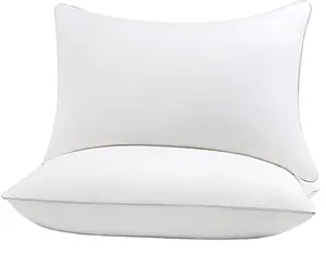 Cuscino in poliestere bianco all'ingrosso per dormire con traversine laterali e fodera rimovibile lavabile