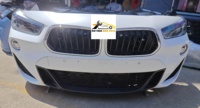 Kit de carrocería de segunda mano para BMW X2 F39: Parachoques delantero, labio de parachoques, faros y kit de reparación de parachoques.