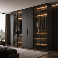 Armoire intégrée de luxe moderne avec portes en verre, éclairage LED et finition en bois foncé, armoires sur mesure pour chambre