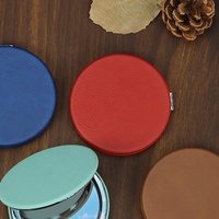 Miroir de poche en cuir PU de haute qualité de forme ronde, miroir compact en similicuir coloré portable, gravable au laser