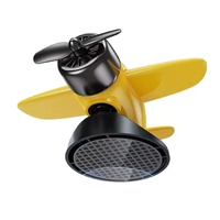 Ornements rotatifs de support de voiture en plastique créatif à énergie solaire pour les décorations de console centrale de voiture en gros