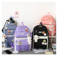 Nouveau Sac à Dos Tendance Grande Capacité Anti-Vol Fermeture à Bouton Style Japonais Décontracté Unisexe Quatre Pièces